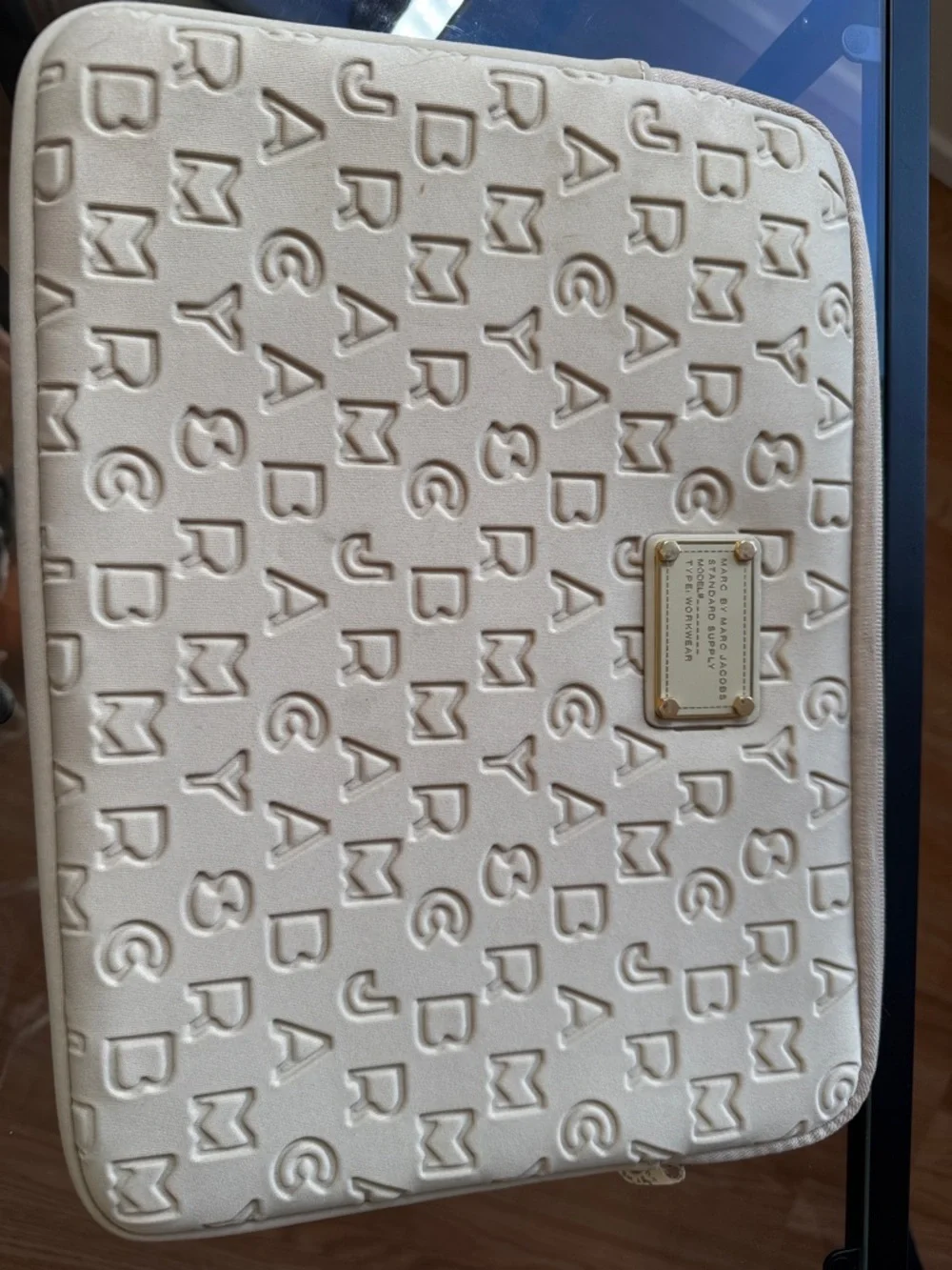 13” Marc by Marc Jacobs Cream Embossed Logo Laptop Sleeve with Gold Plate